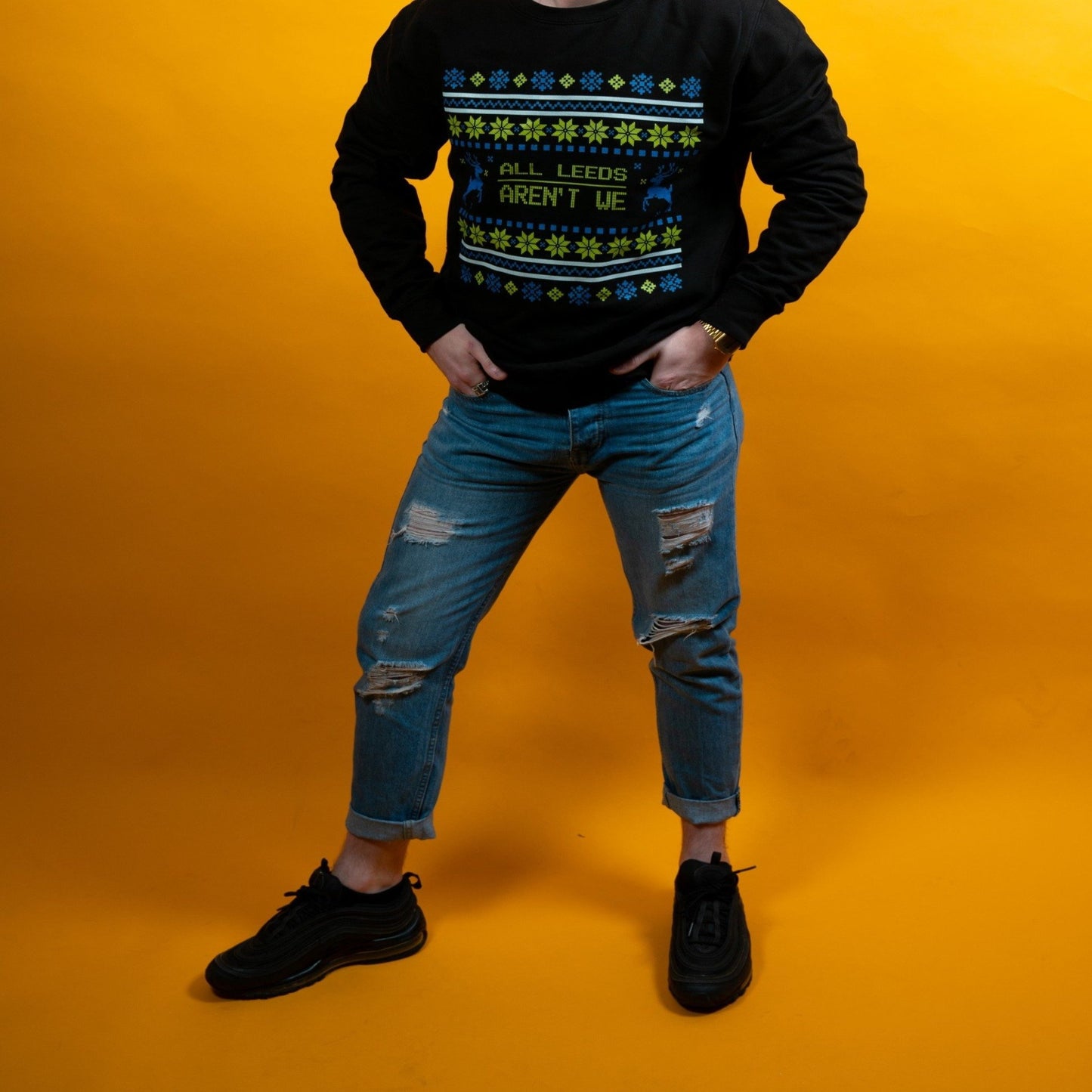Man wearing Leeds united christmas jumper