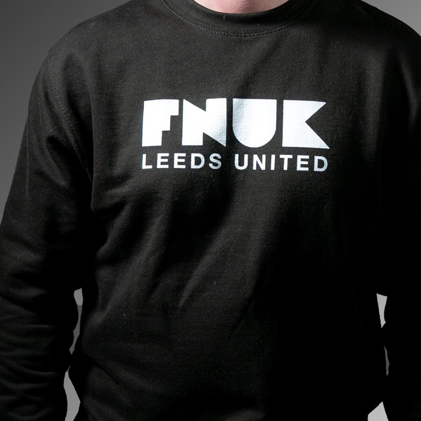 FNUK-logga med Leeds United Jumper för män i svart och vitt