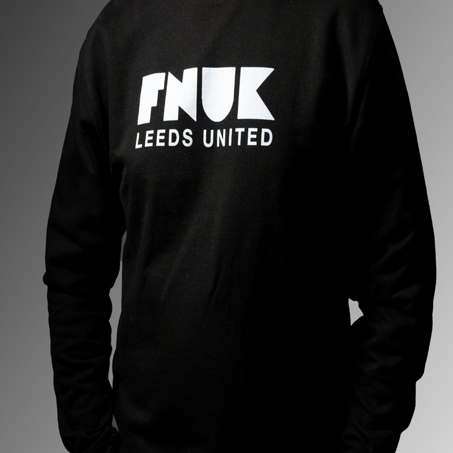 FNUK-logga med Leeds United Jumper för män i svart och vitt